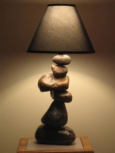 a lamp that has some rocks on it