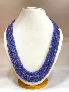 1. Natural Tanzanite Sapphire Beads Necklace.  2. Necklace Length: 18 Inches  3. Necklace Net. Weight: 498.04 carats 4. Necklace Beads Size: 4.00 X 6.28 m.m Size  5. Semi Precious Tanzanite Sapphire  6. If you want fewer strands in the necklace we can also customize it.  7. The Necklace is with Tassel if you want with Silver or Gold Clasp We can also customize it.  8. Necklace lines: 5 Sapphire Beads Necklace, Tanzanite Beads, 4 Necklace, Sapphire Beads, 2 Necklace, Necklace Beads, Gemstone Beaded Necklace, Tanzanite Gemstone, Natural Tanzanite