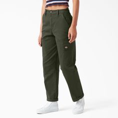 Dickies Women's Cropped Cargo Pants deliver all the utility of a traditional cargo pant paired with perfectly feminine styling. Sturdy with a bit of stretch, nothing is going to stop you from showing up for every adventure. Dickies Pants For Women, Cropped Dickies Outfit, Dickies Green Pants, Womens Dickies Pants, Dickies Cargo Pants Outfits Women, Green Dickies Pants Outfit, Dickies Cargo Pants Outfit, Dickies Pants Women, Dickies Aesthetic