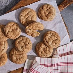 some cookies are sitting on a piece of paper