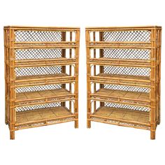 a pair of bamboo shelvings with shelves on each side