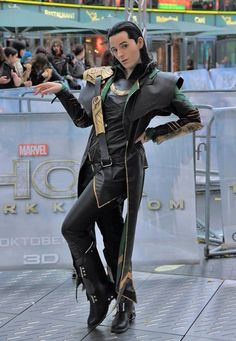 a man dressed as loki in front of a crowd with the caption that says, all the single looks you'll get added to costume