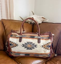 A luxurious and western handcrafted leather duffel bag designed by American Darling here in the heart of Texas. These gorgeous bags deliver a blend of western culture and heritage along with latest fashion and trendy appeal. It makes your appearance eye-catching by its amazing colors, materials, and meticulous hand work. Eco friendly genuine leather is handpicked and sourced from some of the best tanneries in the world. The bag is made by highly experienced and skilled craftsmen of the industry using the highest quality standard of production.Size : H12 X W21 X D11.5 Fully Lined With Pockets & A Zipper. Country Bags, Western Bag, Leather Duffel Bag, Leather Duffel, Western Culture, Gorgeous Bags, Hand Work, Handcrafted Leather, Bye Bye