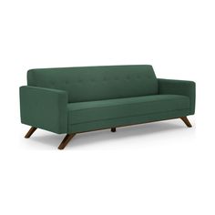 a green couch sitting on top of a white floor next to a wooden leg chair