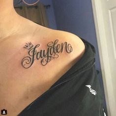 a woman with a tattoo on her shoulder that says, stay and love written in cursive font