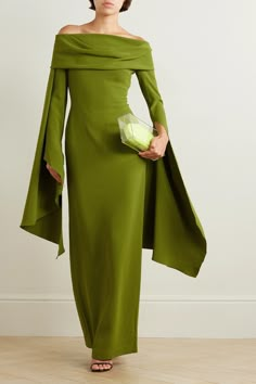 Find SOLACE LONDON Arden Draped Off-the-shoulder Crepe Maxi Dress on Editorialist. Solace London's 'Arden' dress has a draped off-the-shoulder neckline and waterfall-effect sleeves that create plenty of drama. It's cut from 'Sweet Pea' green crepe in a slim fit that creates and accentuates an hourglass silhouette. The skirt is split at the back, so you can walk a little easier in heels. Long Sleeve Dress Gala, Solace London Green Dress, Green Modest Dress, Olive Dress Outfit, Elegant Dress Outfits, Modest Outfits Dresses, Winter Wedding Guest Outfit, Wedding Guest Outfit Winter, Crepe Maxi Dress