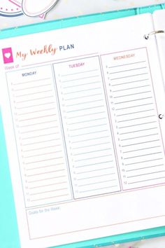 a planner with the words my weekly plan on it