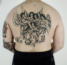 an angel tattoo on the back of a man's upper body, with two cherubs