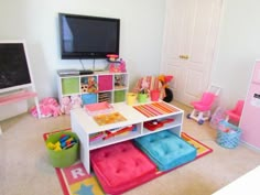 a child's playroom with toys and decor