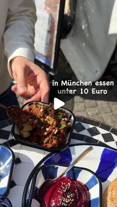 a person is serving food on a plate