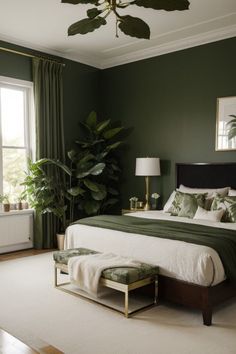 a bedroom with green walls, white carpet and large bed in the middle of it