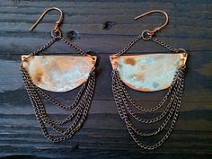 Vintage, beautiful earrings made with copper metal and silver chains. Copper has been oxidized with verdigris patina to give it an aged and vintage look (no two pairs of earrings look the same). Antique silver chains hang from each earring. Ear hooks are made by me using 18g 925 silver or copper wire. Mention at checkout. Super light weight. All my jewelry coated with protective wax finish to prevent tarnish. Lenght: 4 inches / 10cm *Shades of the patina vary due to the organic chemistry of the Bohemian Brass Earrings In Rust Color, Bohemian Rust Brass Earrings, Rust Colored Bohemian Metal Jewelry, Bohemian Rust-colored Metal Jewelry, Vintage Copper Earrings With Patina, Copper Dangle Earrings With Patina, Copper Dangle Jewelry With Patina, Unique Patina Copper Earrings, Unique Copper Earrings With Patina