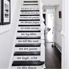 the stairs are decorated with black and white wall decals that say we always have fun