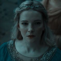 a woman with blonde hair wearing a tiara in a scene from hbo's game of thrones