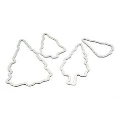 three cookie cutters shaped like christmas trees on a white background with the shape cut out