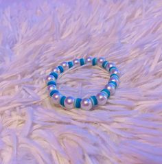 The Blue Bubble Bracelet is a clay bead bracelet that has pearls and different shades of blue shown across the clay beads. Beaded Bracelet Ideas, Bubble Bracelet, Pearl Beaded Bracelet, Clay Bead Bracelet, Clay Bead, Bracelet Blue, Bracelet Ideas, Clay Beads, Fort Worth