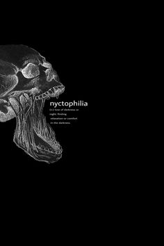 a black and white photo of an animal's head with the words nyctophilia on it