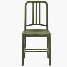 a green plastic chair against a white background