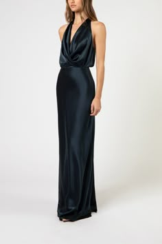 Plunge neckline halter gown in pure silk charmeuse. Features a full length bias cut skirt with an invisible zipper closure at back. Made in USA.    Composition: 100% silk Pleat Draping, Draped Gown, Drape Gowns, Michelle Mason, Bias Cut Skirt, Wedding Guest Attire, Halter Gown, Black Tie Dress, Looks Party