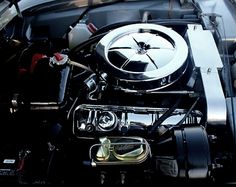 the engine compartment of a car is shown