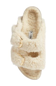 Plush shearling adds slipper-quality comfort to this cozy-chic slide sandal topped with a glossy branded buckles and grounded on signature bone treads. Cushioned footbed with arch support Genuine shearling (Australia) upper and lining/synthetic sole Imported Fuzzy Birkenstocks, Birkenstock Arizona Big Buckle, Arizona Big Buckle, Fuzzy Slides, Hot Boots, Fire Fits, Hype Shoes, Cozy Chic, Birkenstock Arizona