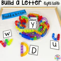 the letter y is for build a letter light table with letters and numbers on it