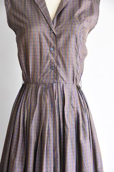 "Vintage 1950s silk daydress. Plaid in blue, green, red and yellow. Pointed collar, darted bust and nipped waist. Front pocket with a hidden \"T\" design. Full skirt. Front button and snap closure. State of garment | ok, some tiny holes in the skirt and some pin sized nicks in the back & a little in front (hard to tell due to the print) refer to photos 4/5 & request further photos if needed. Measurements ✂--- best fit | extra small / small bust | up to 36\" shoulders | 16.5\" shoulder to Midi Dress Vintage, Vintage Black Cocktail Dress, Peach Dress, Paisley Dress, Plaid Dress, Black Cocktail Dress, Little Dresses, Full Skirt, Flower Dresses