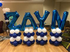 balloons are arranged in the shape of letters that spell out'say yay '