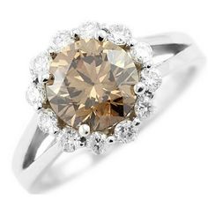 Just like my engagement ring but with the center diamond a little smaller than that and different color. This is a verragio design! Champagne Diamond Ring Engagement, Champagne Engagement Rings, Split Engagement Ring, Brown Diamond Engagement Ring, Champagne Diamonds Engagement, Champagne Diamond Rings, Cognac Diamonds, Colored Diamond Rings, Diamond Halo Engagement Ring