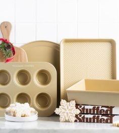 an assortment of baking supplies sitting on a counter