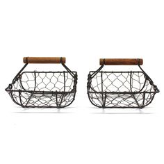 two metal baskets with wooden handles on white background