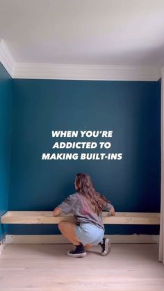 a woman sitting on a bench in front of a wall that says, when you're adopted to making built - ins