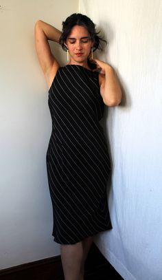 "Simple perfection. This dress is cut on the bias from semi-matte diagonally pinstriped silk (with a subtle sheen), fully lined with semi-sheer black silk. Sleeveless, boat neck. Perfect for work, a special occassion, really anything. Effortless and timeless, in perfect condition. Measurements (laid flat; please note that there are a dew inches of give due to bias cut; fits like a true modern-day size 6): Bust: 17\" Waist: 14\" Hip: 16\" Length: 44\" Tag reads: Lauren Ralph Lauren Size 6 100% si Boat Neck Dress, Lauren By Ralph Lauren, Black Silk, Dress Clothes For Women, Boat Neck, Lauren Ralph Lauren, Dress Outfits, Midi Dress, Ralph Lauren