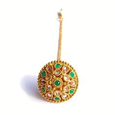 Name Of Product:- Antique Borla (Indian Fashion Jewelry) Width: 3 centimeter Shipping Processing Time: 1-3 days Delivery Time: Depend on Country High-quality Borla style Kundan tika. The tika is Rajasthani style Borla. Ideal for wedding, mehndi ceremony. Absolutely stunning. Finished off beautifully by adding Polk. To view our latest collection of Borla, Mang Tikka, and Hair Accessories please click the below link. https://www.etsy.com/uk/shop/HemrajJewellers?ref=seller-platform-mcnav&sectio Round Meenakari Tikka As Gift, Traditional Green Round Jewelry, Gift Tikka With Intricate Design, Green Intricate Design Tikka For Festivals, Round Tilla Tikka As A Gift, Green Jewelry With Motifs For Gift, Festive Green Jewelry With Motifs, Handmade Gold Tikka As Gift, Bohemian Gold Tikka As Gift