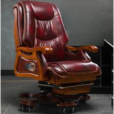 an office chair made out of leather with wheels