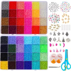 there are many different colors of beads and scissors