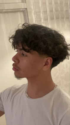 idk Low Taper With Wavy Hair, Wavy Edgar Haircut, Low Taper Fade Haircut Long Wavy Hair, Low Taper Fade Wavy Hair Men, Taper Haircut Wavy Hair, Low Taper Medium Hair Men, Low Mid Taper Fade, Longer Curly Mens Hair, Low Taper Fade Haircut Front View