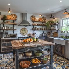 a kitchen filled with lots of wooden shelves