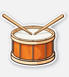 a sticker of a drum and two drumstickers on a white background with shadow