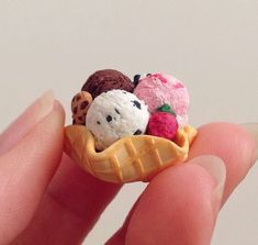 small miniature food items in the shape of waffles and ice cream