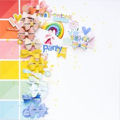 a birthday card with lots of colorful paper decorations on top of it and the words happy birthday written in large letters