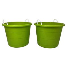 two green plastic buckets sitting next to each other