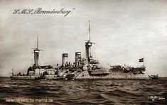 an old photo of a battleship in the water