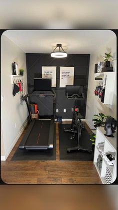 a home gym with treadmills, exercise mats and other equipment in the room