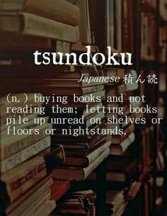 an image of a book shelf full of books with the words tsundoku written in japanese