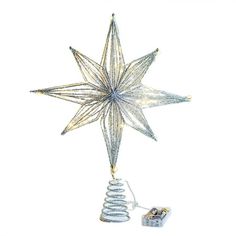 a christmas ornament with a star hanging from it's side