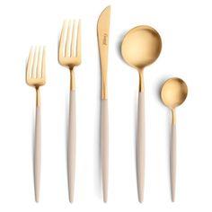 four forks, two spoons and one knife on a white surface with gold colored handles