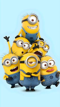 a group of minion characters standing next to each other in front of a blue background