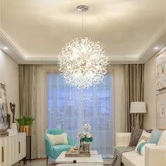 a living room filled with furniture and a chandelier hanging from the ceiling in front of a window