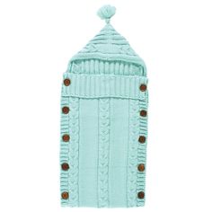 a blue knitted sweater with buttons on the front and back, it has a pom - pom at the top